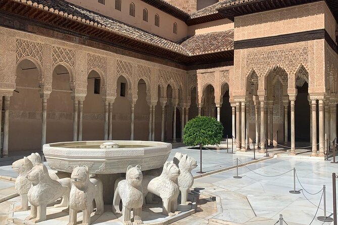 Alhambra: Complete Guided Tour with Nasrid Palaces Tickets - Alcazaba walls and the Torre de la Vela