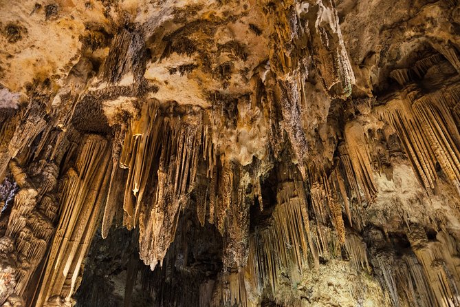 Coasts and Mountains: Nerja to Frigiliana with Nerja Caves Small-Group Day Trip - Leaving Granada in an air-conditioned vehicle
