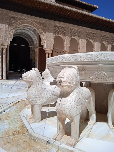 Granada: Alhambra, Alcazaba, and Nasrid Palaces Tour - Charles V Palace, a bold Renaissance interruption