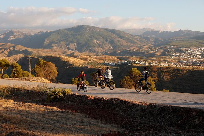 Granada: Alhambra and Sierra Nevada Sunset Views by E-Bike - Sacromonte and its cave-house traditions