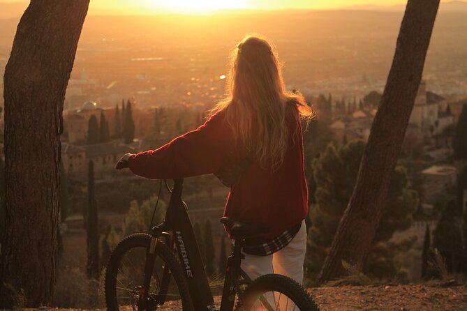 Granada: Alhambra and Sierra Nevada Sunset Views by E-Bike - Riding through the Alhambra forest