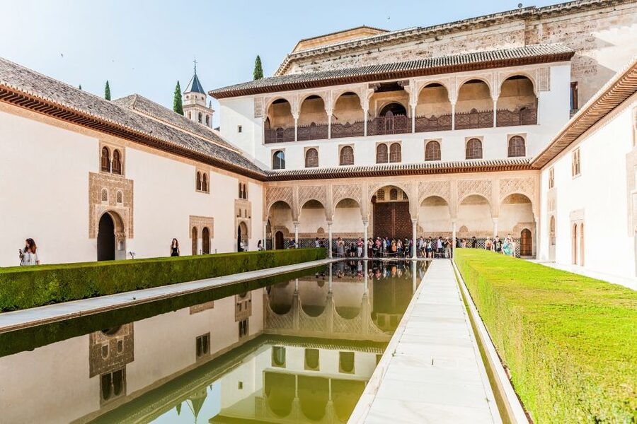 Granada: Alhambra & Nasrid Palaces Tour with Tickets - Palace of Charles V and the layered Alhambra
