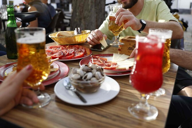 Granada Highlights Tour with Tapas Breaks by Electric Bike - Along the river and toward the hills