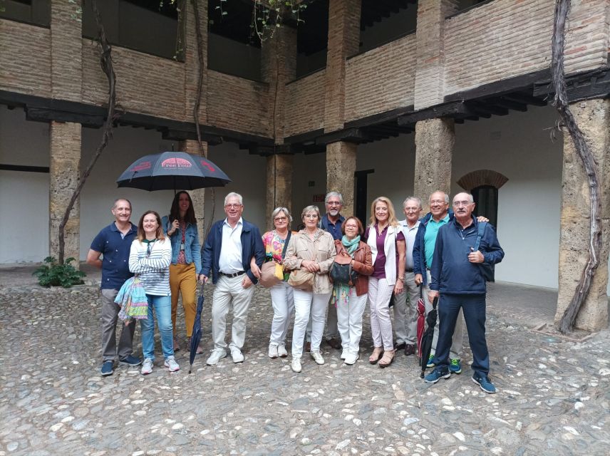 Granada: Historic Center and Lower Albaicin Walking Tour - Walking the historic center through squares and old institutions