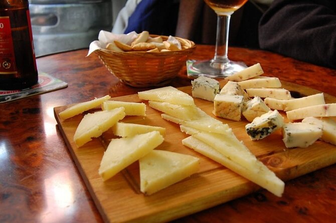 Old Granada Market & Food Tasting Tour - Walking through Granada’s old town market stalls