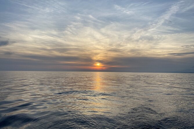 Sailing at sunset along the cliffs of Maro-Compartida - Key points to know before you book