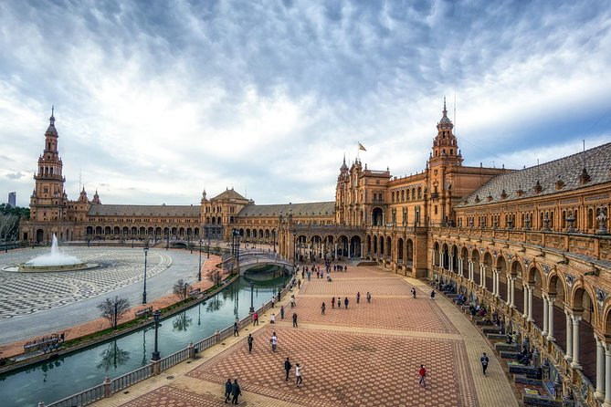 Seville Tour with Alcazar, Cathedral and Giralda from Granada - The Giralda tells Seville’s Muslim and Christian story